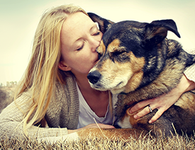 Female pet owner and old dog